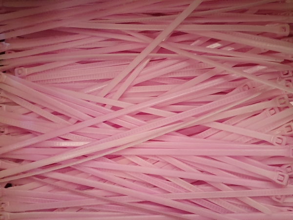 Pink biodegradable cable ties.